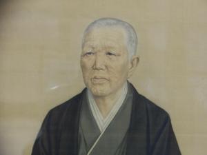 着物を着た白髪の男性の肖像画のイラスト